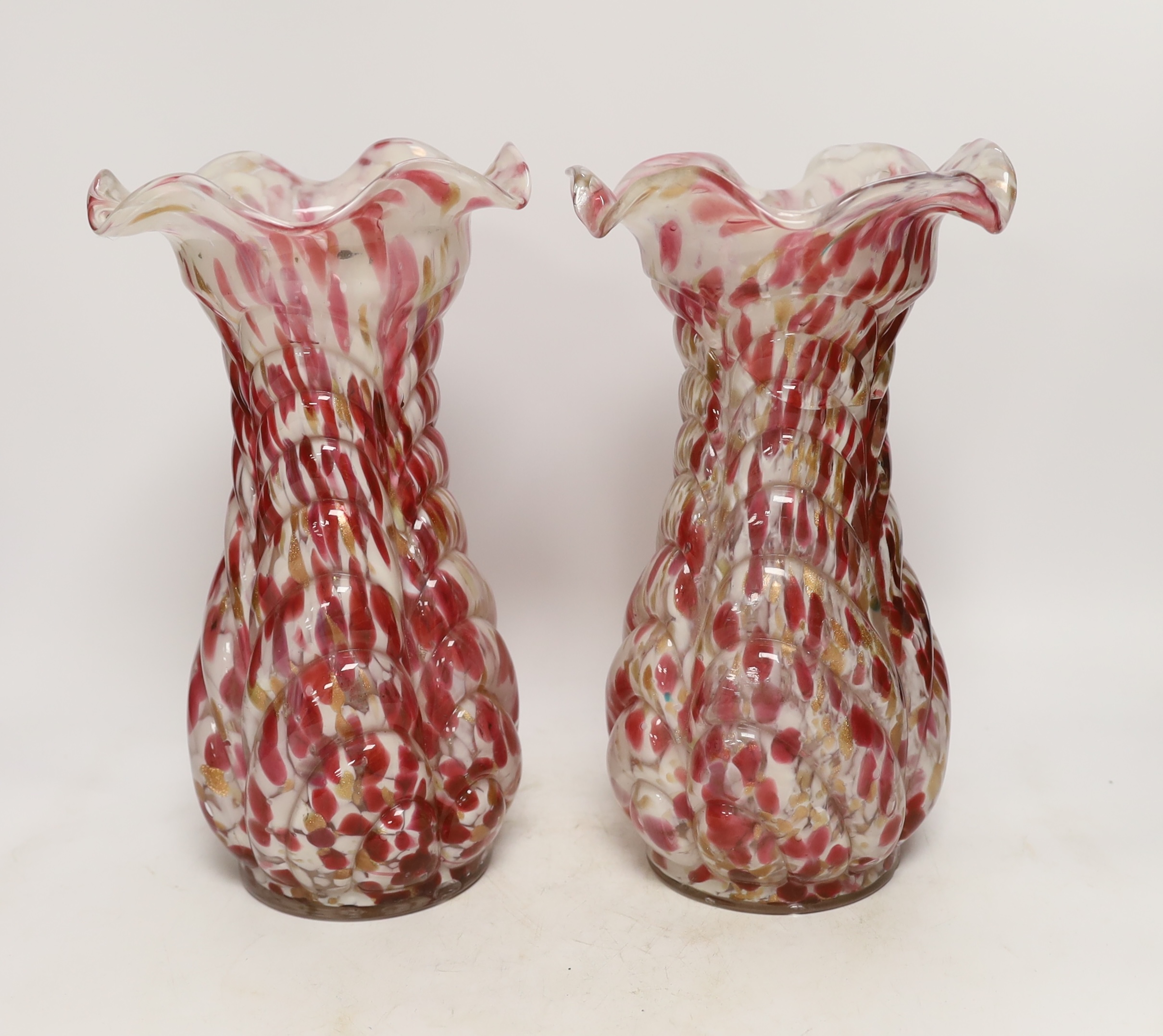 A pair of French red and white glass vases, marked Depose, 29cm high